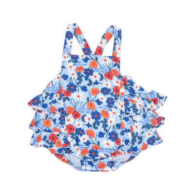 The Poppy Days Ruffle Sunsuit by Angel Dear is a charming baby romper with ruffled layers in a floral pattern of orange and blue flowers on light blue muslin. It features tank top straps and button closures at the bottom for easy changes.