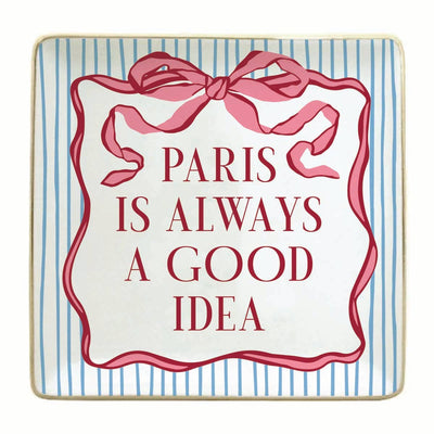 The soiree-sisters Paris Trinket Tray, with blue stripes, a red ribbon design, and "PARIS IS ALWAYS A GOOD IDEA" in bold red letters, makes a charming gift for any occasion.