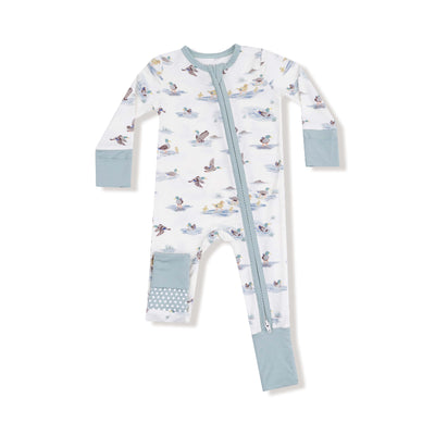The Angel Dear Migrating Mallards Two-Way Zipper Romper features a duck print, light blue cuffs, a diagonal zipper from collar to left leg, and contrasting blue-and-white patterns on the left ankle and right foot.