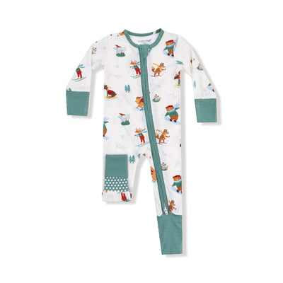 The Angel Dear Winter Animal Sports Two-Way Zipper Romper features playful bears and foxes in scarves on snowy mountains, with teal cuffs, a white bamboo fabric, and one footed and one footless leg for comfort.