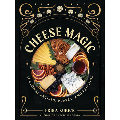 Book cover for Cheese Magic by Hachette Book Group, featuring an ornate gold frame and a cheese platter with assorted cheeses, crackers, nuts, dried fruit, and orange slices on a black background.