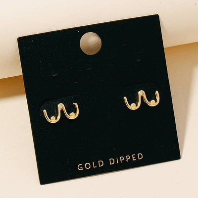 The Anarchy Street Gold Dipped Breast Outline Stud Earrings feature a chic abstract breast design and come displayed on a black card labeled GOLD DIPPED.