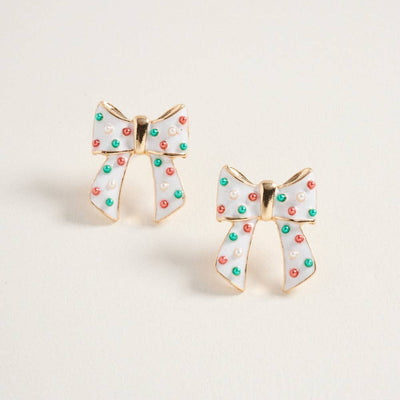 The Christmas Bow with Pearls Post Earrings by Designature New York feature gold trim, white enamel, and colorful polka dots—perfect playful holiday jewelry—shown on a plain light background.
