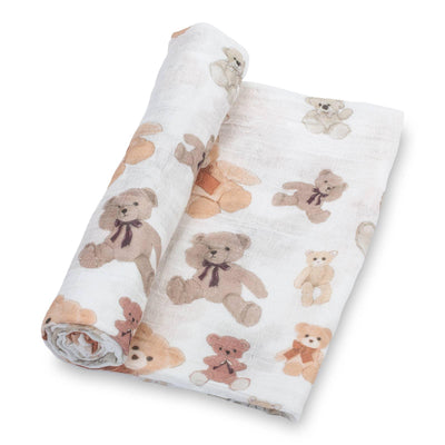 The LollyBanks Bear Hugs Baby Muslin Swaddle Blanket features a white cotton muslin design with brown and beige teddy bears—ideal as a cozy baby blanket or thoughtful baby shower gift.