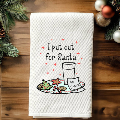The Moonlight Makers "I Put Out for Santa Christmas Hand Towel" is a pure cotton, non-toxic towel featuring milk, cookies, a note for Santa, and festive holiday details—perfect for your kitchen decor.
