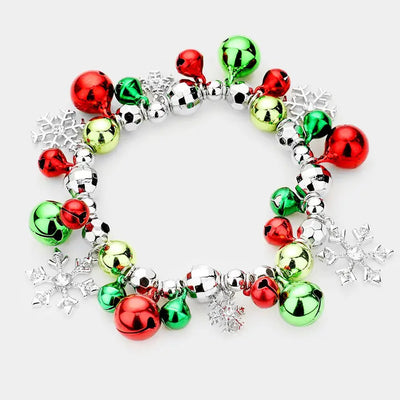 The Golden Stella Snowflake Christmas Jingle Bell Stretch Bracelet features red, green, and silver bells, shiny beads, and snowflake charms. This stylish 1-inch bracelet is lead and nickel compliant.