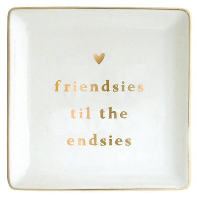 The soiree-sisters Friendsies To The Endsies Ceramic Trinket Tray is a chic white square tray with gold trim, “friendsies til the endsies” in gold letters, and a gold heart—perfect as a jewelry holder or friendship gift.