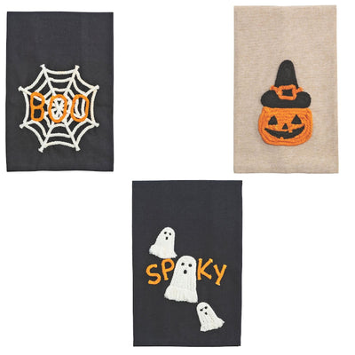 The Mud Pie Halloween Glow Rope Towels set includes three cotton hand towels: one with a spiderweb and “BOO,” one with a pumpkin in a witch hat, and one featuring two ghosts and “SPOOKY”—all with playful rope appliqué details.