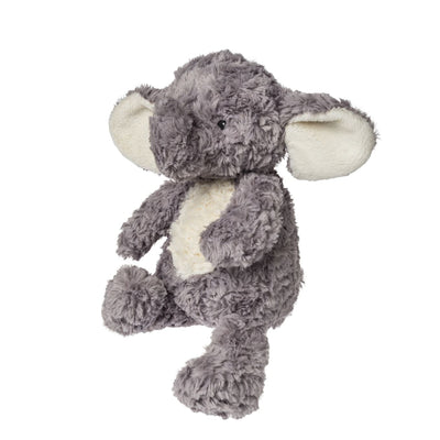 The Again Friends Elephant by Mary Meyer is a plush gray toy with large white ears made from eco-friendly recycled plastic. It sits upright with one leg extended, the other folded, and has rounded feet and arms adding to its cuddly texture.