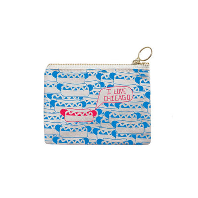 The Chicago Coin Pouch by Maptote is a small cotton canvas zip pouch with a blue and white hot dog pattern, featuring one red hot dog and an "I LOVE CHICAGO" speech bubble, plus a metal ring—perfect for a unique Chicago gift.