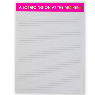 Chez Gagné offers the A Lot Going On At The Moment large memo lined notepad, featuring thick pages and a bold pink header with striking white and gold text.