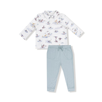 The Angel Dear Migrating Mallards Polo with Jogger Pants set features a long-sleeve bird print collared shirt and light blue drawstring joggers in organic cotton, shown on a white background.
