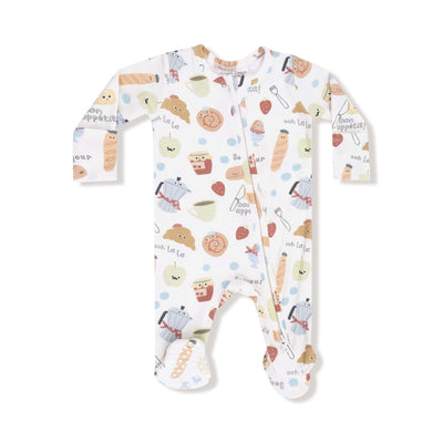 The Bonjour Breakfast Two-Way Zipper Footie by Angel Dear features white bamboo fabric with colorful breakfast-themed prints and fun phrases, a diagonal front zipper, and fold-over cuffs for extra comfort.