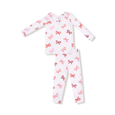 The Candy Cane Bows Loungewear Set by Angel Dear features a white ribbed modal long-sleeve top and pants with pink and red bow prints, shown laid flat on a white background.