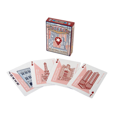 The Chicago Architecture Playing Cards from Transit Tees are displayed with the box upright and four cards out, each decorated with red and blue illustrations of iconic local buildings.