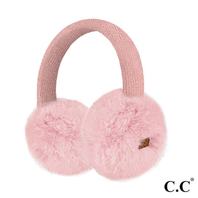 Rose Faux Fur Ear Muffs by Judson & Company feature a soft, fluffy texture, an adjustable knitted headband, and a small brown tag on one earpiece. The background is white with the C.C logo in the lower right corner.