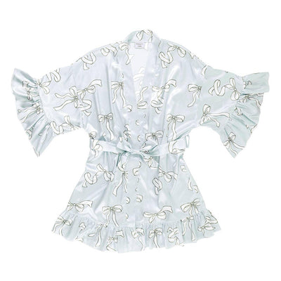 The Bella Sleep + Spa Ruffled Satin Robe - Blue Bows features a light blue satin with white bow print, ruffled sleeves and hem, matching waist belt, and a loose, flowy fit for comfort.