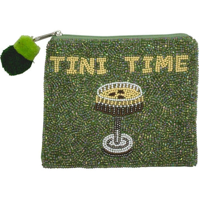 The Tini Time Beaded Coin Purse by Judson & Company is a green cotton pouch with TINI TIME in yellow beads, a beaded cocktail glass design, and a playful green pom-pom zipper.