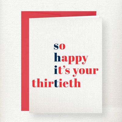 Kramer Drive's "Shit 30 Birthday Greeting Card" is an A2 folded card with a colored envelope. The front says "so happy it’s your thirtieth" in blue and red on white textured paper. Card is blank inside for your message.