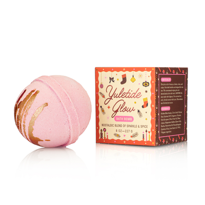 The Old Whaling Company’s Yuletide Glow Bath Bomb, pink with gold accents, comes in a festive, holiday-illustrated box—perfect as a stocking stuffer or Christmas gift with nostalgic sparkle and spice.