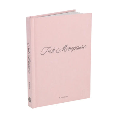 The F*ck Menopause Journal by Chronicle Books is a pink hardcover with cursive title on the cover and spine, plus "A Journal" at the bottom. Ideal for menopause support, it’s shown on a plain white background.