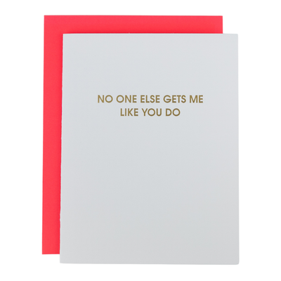 The No One Else Gets Me Like You Do Greeting Card by Chez Gagné is a bright white, tree-free card with gold foil text and comes with a red envelope.
