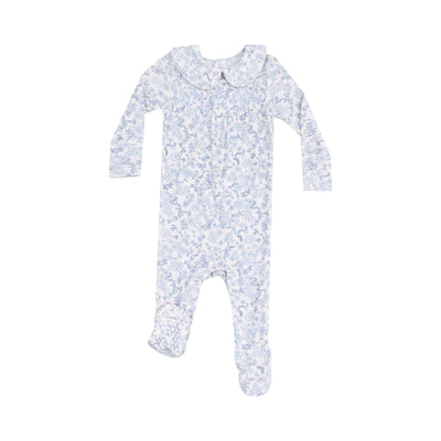 The Blue Calico Floral Smocked Peter Pan Footie by Angel Dear is a soft beige onesie with a blue floral pattern, featuring a charming collar, long sleeves, and convenient front and leg snaps for easy changing. Made from bamboo viscose, it combines comfort and style for your little one.