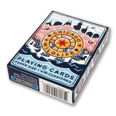 Chicago Wildlife Playing Cards by Transit Tees feature city skyline, trees, and water scenes. This poker-size deck has an air-cushioned finish, comes in colorful packaging, and shows a barcode on the side.