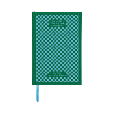 The Designworks Ink Pardon Me Journal features a green bookcloth cover with a blue-green check pattern, the phrase "Pardon Me, What The Heck Is Going On? And Other Hard-Hitting Questions," lay-flat binding, and a blue ribbon bookmark.