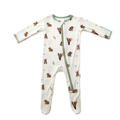 The Bamboo Little Koala Zippered Footie is a white baby sleeper with green trim, a front zipper, and a cute brown bear pattern. Made from soft bamboo viscose, this eco-friendly option keeps your little one cozy and comfortable.