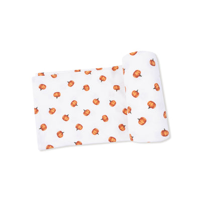 The Angel Dear Little Pumpkins Bamboo Ribbed Swaddle Blanket features a soft white fabric with an all-over orange pumpkin print—perfect for keeping your baby cozy and comfortable.