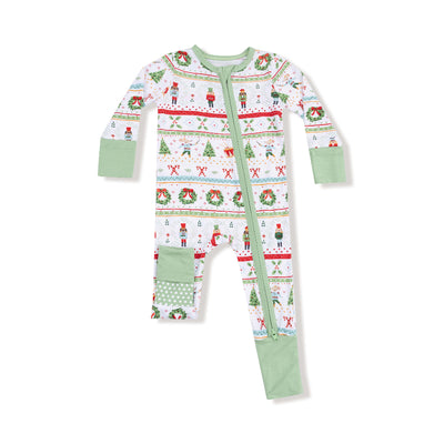 The Nutcracker Fair Isle Two-Way Zipper Romper by Angel Dear is a festive bamboo romper for kids, with long sleeves and legs, Christmas patterns, green accents, fold-over cuffs, and an asymmetrical front zipper.