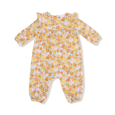 The Angel Dear Sweet Amber Floral Ruffle Sleeve Romper is a long-sleeved organic cotton muslin baby romper with elastic cuffs and an orange, yellow, and white floral print on a light background. Machine washable on gentle cycle.
