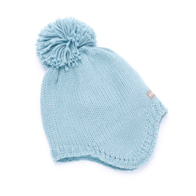 Light blue knitted hat with a pom-pom on a white background