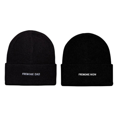 Two black HATPHILE beanies, each $22, sit side by side; one is embroidered with "FRENCHIE DAD" and the other with "FRENCHIE MOM" in white on the folded brim.