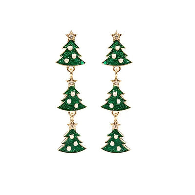 The Golden Stella Christmas Tree & Pearl 3 Drop Earrings feature three green enamel Christmas tree charms with gold star tops, white dot accents, and hypoallergenic titanium posts.