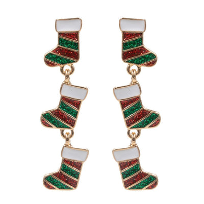 Add a festive touch with Golden Stella's Dangling Christmas Stockings Earrings, featuring two striped charms with red, green, and white glitter details and gold outlines—perfect for sparkling holiday style.