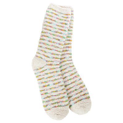The Holiday Stripe Cozy Crew Slipper Socks by World's Softest Socks are fuzzy women's socks in cream with pastel green, pink, yellow, and blue stripes. Made in Korea, these one-size-fits-most socks have a soft, textured feel.