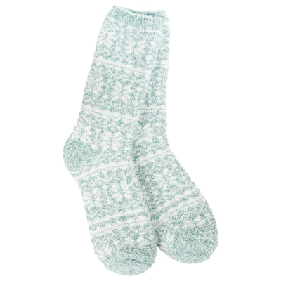 The World's Softest Socks Fair Isle Green Cozy Crew Slipper Socks offer warmth and comfort with a fuzzy polyester texture, subtle pattern, and one-size-fits-most design. Displayed against a plain white background.