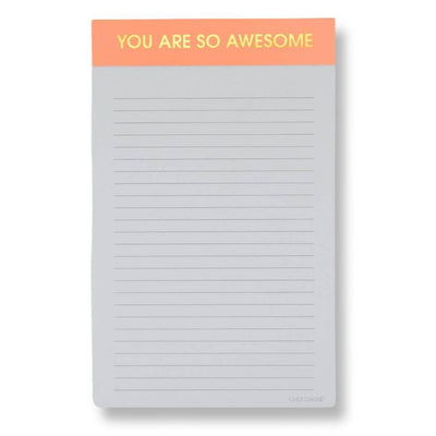 The Chez Gagné You Are So Awesome Lined Notepad features perforated pages and an orange header with “YOU ARE SO AWESOME” in yellow caps. The rest of each page is blank with horizontal lines for writing.