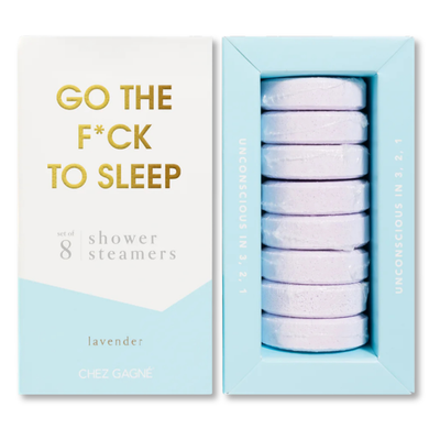 Chez Gagné’s Go The F*ck To Sleep Aromatherapy Shower Steamers come in a set of 8 lavender-scented tablets, displayed in a blue tray with "UNCONSCIOUS IN 3, 2, 1" on the side—perfect for your bedtime routine.