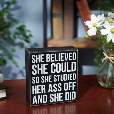 she believed she could boxed sign