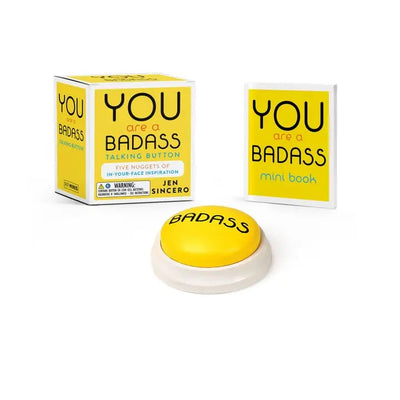 The You Are a Badass Talking Button by Hachette Book Group, featuring a yellow button, matching mini book, and affirmation-themed box, displayed on a white background.