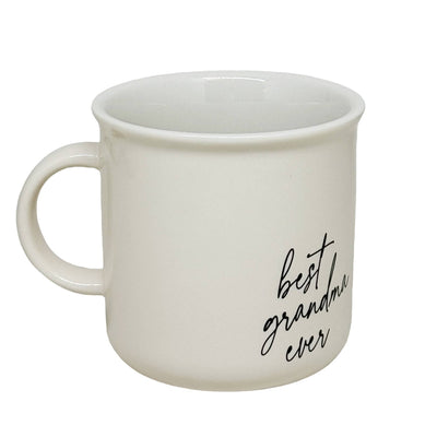 The Best Grandma Ever 11oz Campfire Coffee Mug by Sweet Water Decor is a white ceramic cup with best grandma ever in elegant black script. Its classic design includes a smooth finish, sturdy handle, and its both dishwasher and microwave safe for easy use.