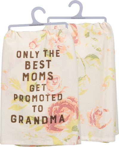 Two soft cotton kitchen towels, hung on plastic hooks, feature ONLY THE BEST MOMS GET PROMOTED TO GRANDMA in brown text. These floral-patterned treasures with pastel roses and green leaves on cream fabric add charm and warmth. Product: Best Moms Get Promoted To Grandma Kitchen Towel by Primitives by Kathy.