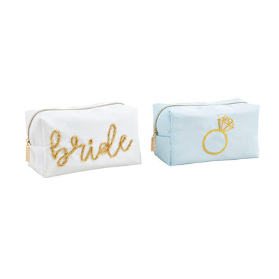 The Bride Sparkle Cases by Mud Pie, priced at $25 each, feature a white case with bride in tinsel and a light blue case with a gold diamond ring outline. Both rectangular polyester pouches have elegant gold zipper pulls.