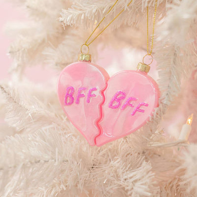 The Rock Paper Scissors BFF Heart Christmas Glass Ornaments 2-piece set features a pink glittery split heart with "BFF," ideal as a best friend ornament for your 2025 white Christmas tree.