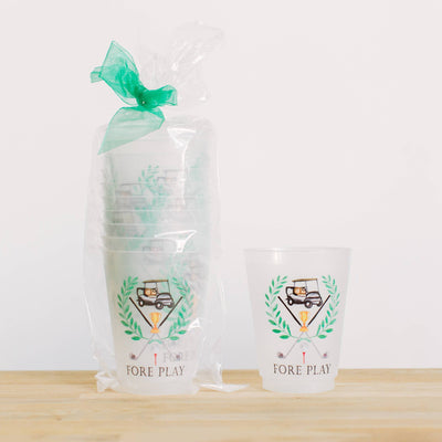 Sip Hip Hooray’s Fore Play Golf Masters Frosted Cups, 16oz, come in a gift bag with a green bow. Each set of 6 features a golf cart, clubs, laurel leaves, and FORE PLAY text. High-quality print; hand wash recommended.