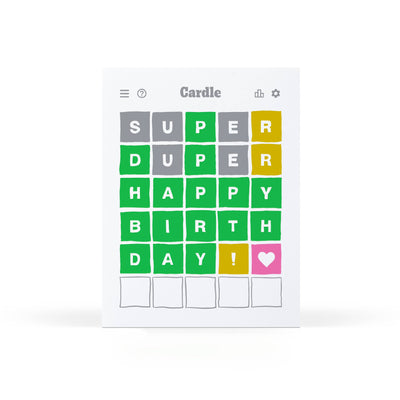 The Birthday Cardle Greeting Card by Sweet Bippy Press spells out SUPER DUPER HAPPY BIRTHDAY! in colorful, Wordle-inspired squares—gray, yellow, green, and pink heart—for a playful letterpress printed card.