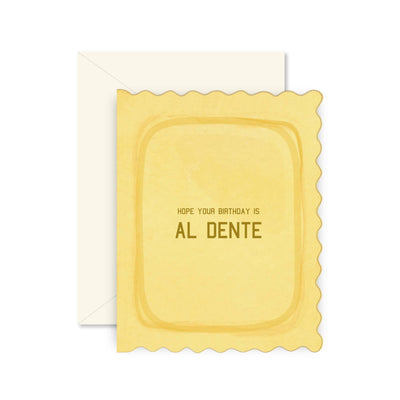 The Pasta Al Dente Birthday Greeting Card by Ginger P. Designs is shaped like lasagna pasta and reads Hope your birthday is AL DENTE, making it a delightful greeting card for any pasta lover. Comes with a cream-colored envelope.
